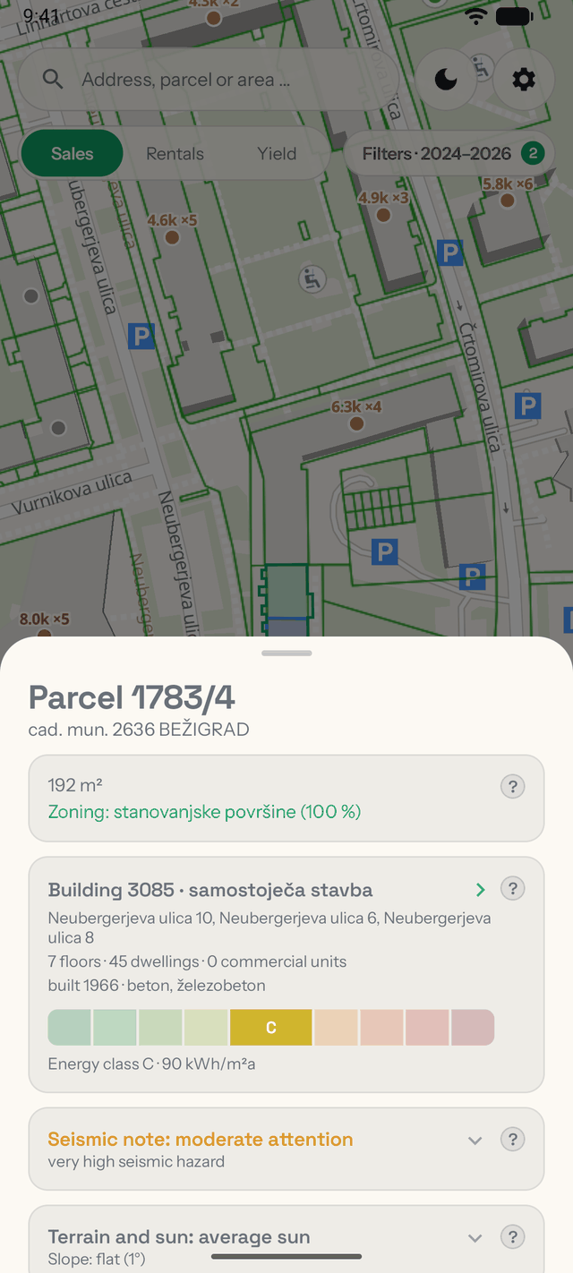 Tapping a building on the map opens its parcel, zoning, energy, seismic and terrain summary